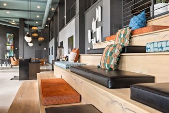 Gaming lounge with billiards, foosball, shuffleboard, and vintage arcade games